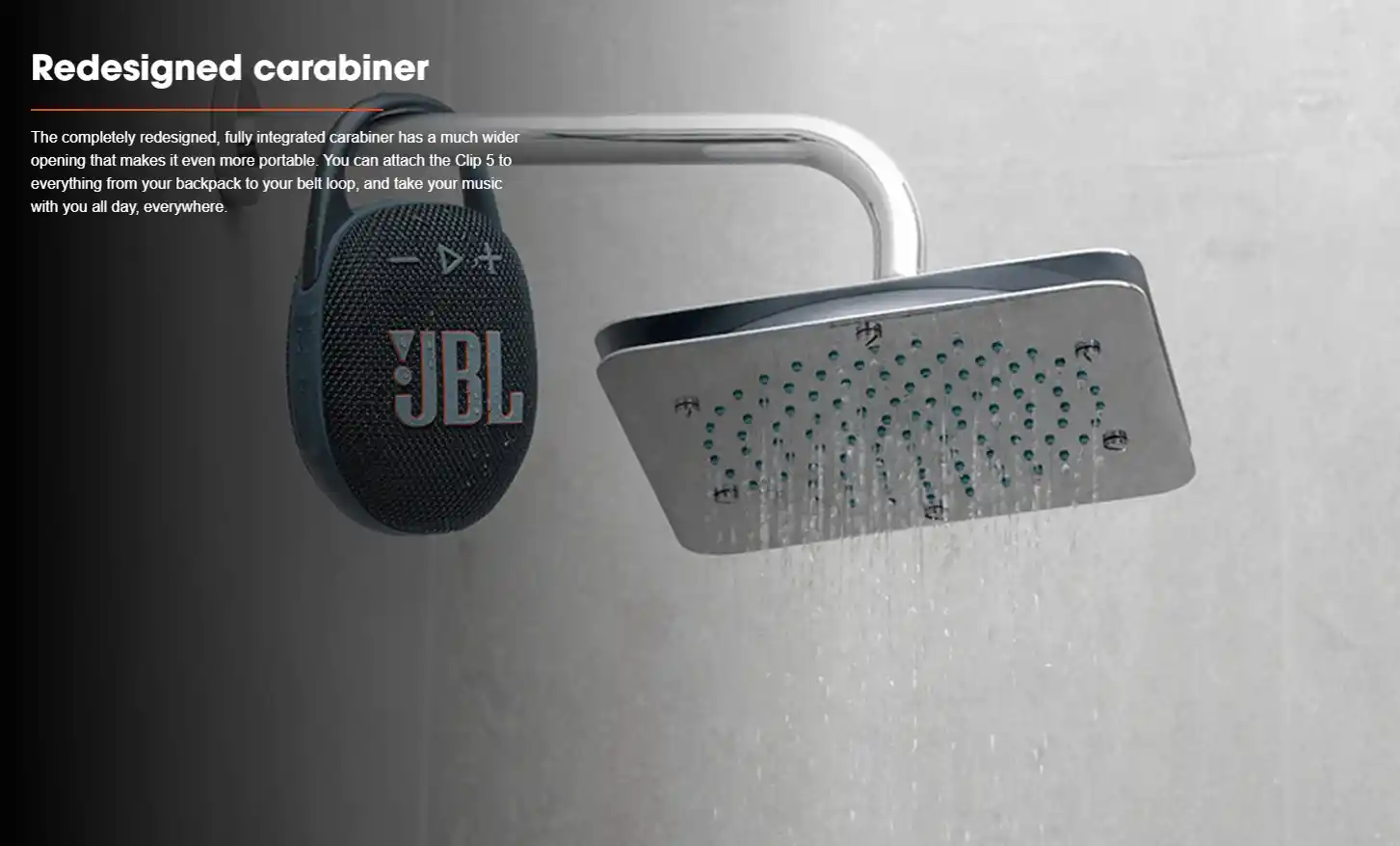 JBL Clip 5 Bluetooth speaker with Auracast powers on a table