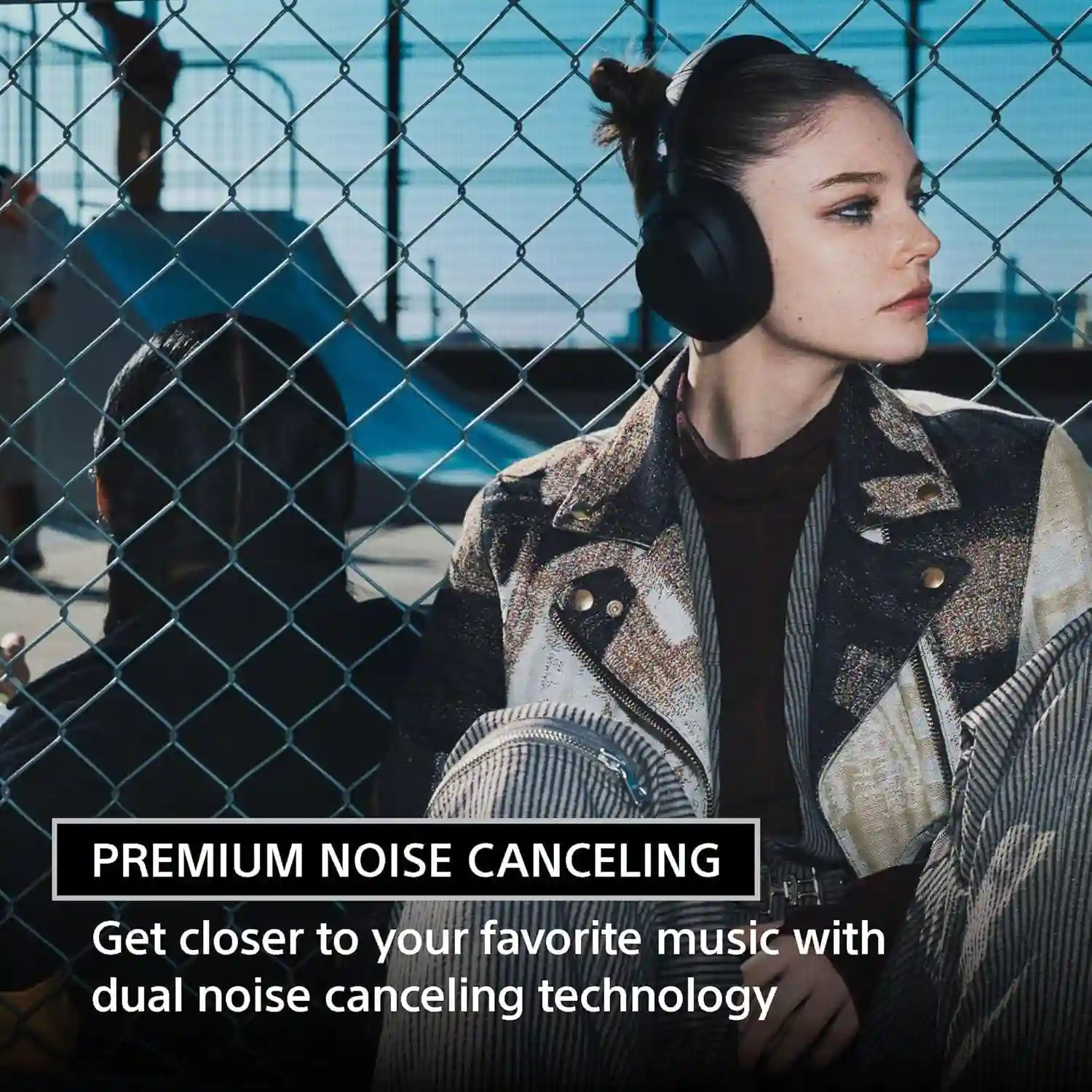 Person wearing Sony ULT WEAR headphones, demonstrating wireless use.
