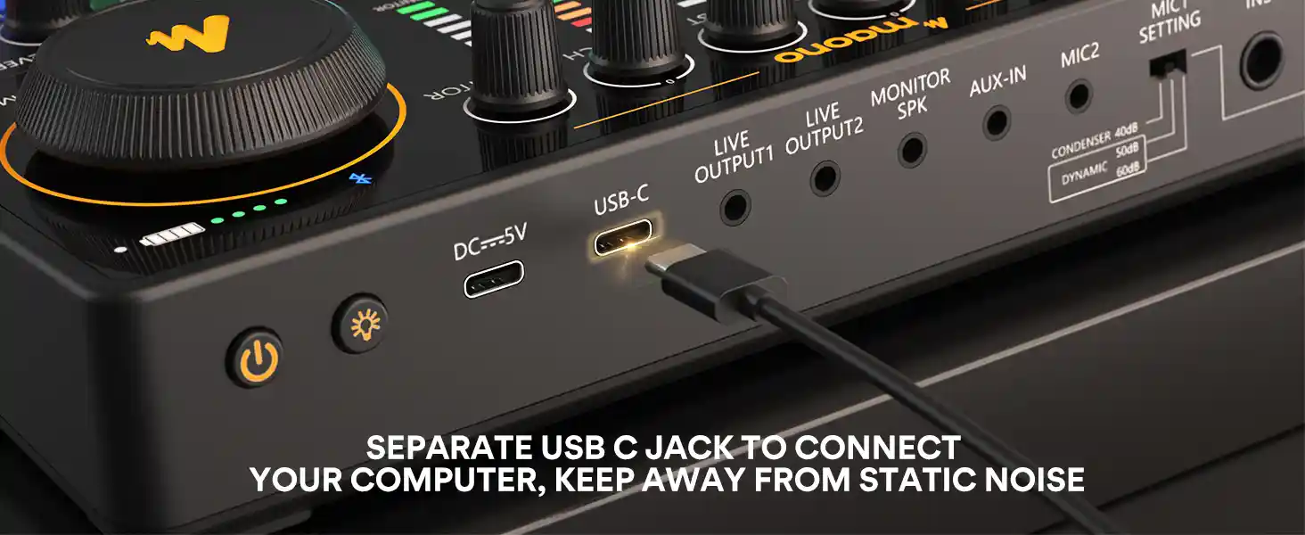 MAONO MAONOCASTER AME2 with headphones and microphone connected for real-time monitoring.