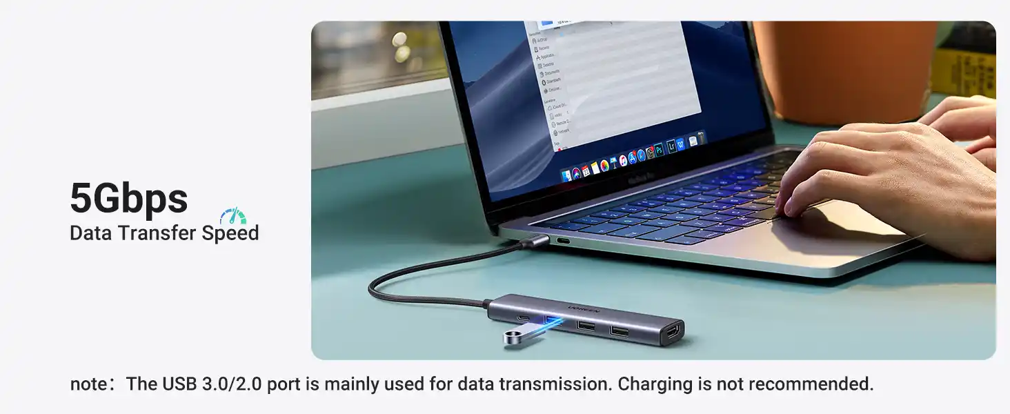 UGREEN Revodok 105 USB C Hub and UGREEN Mac mini M4 Docking Station connected to laptop